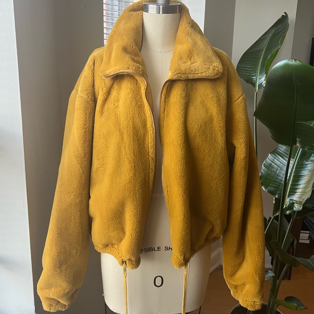 Mustard faux fur bomber jacket.